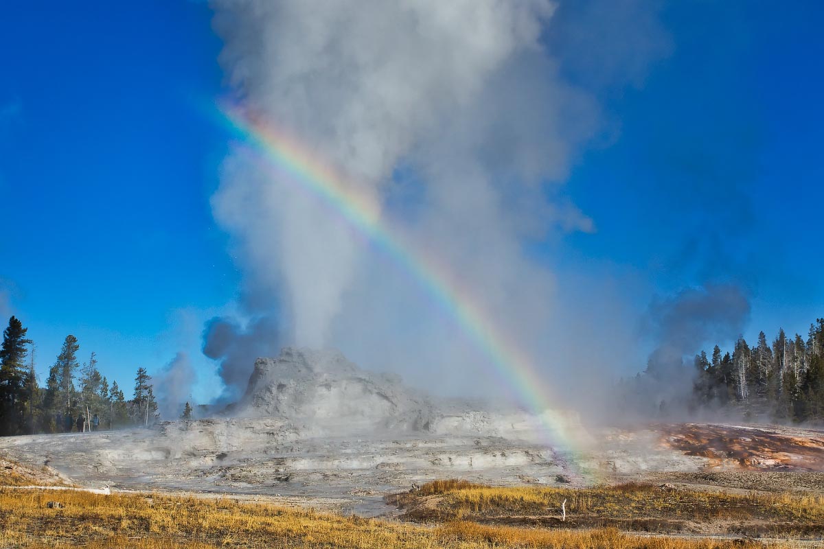 Castle Geyser rainbow Yellowstone Wyoming