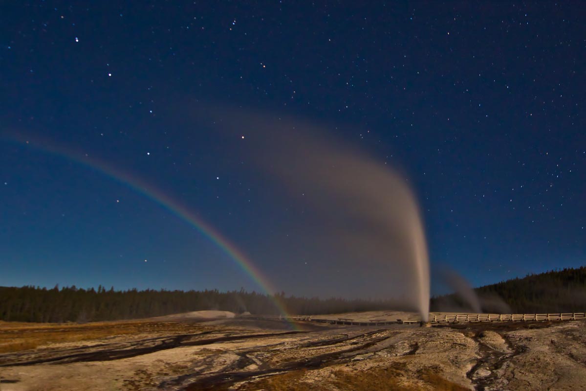 Beehive Geyser with moonbow Yellowstone Wyoming