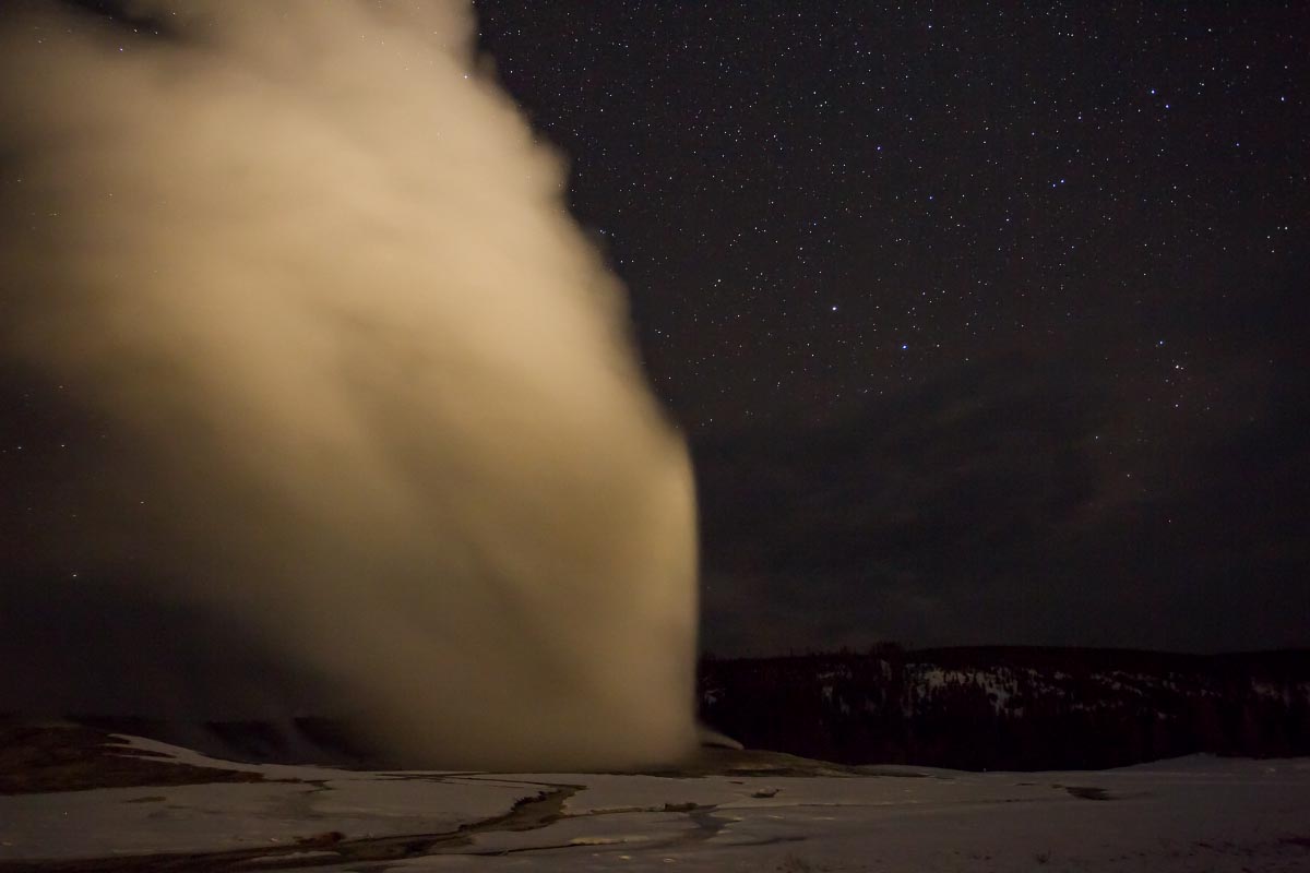 Old Faithful Geyser at night Yellowstone Wyoming