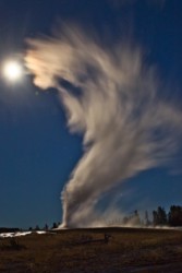 Old Faithful Geyser with moon Yellowstone Wyoming